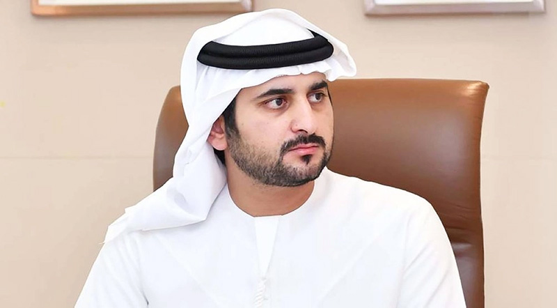 Maktoum bin Mohammed congratulates Mohammed Al Gergawi on being awarded the Union Medal
